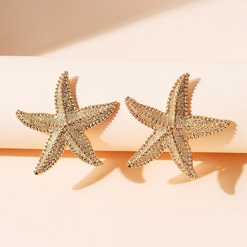Boucles d'oreilles étoile de mer dorées bohème Boucles d'oreilles étoile de mer dorées bohème – Image 7